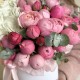 Нежная композиция в шляпной коробке из роз и гортензии